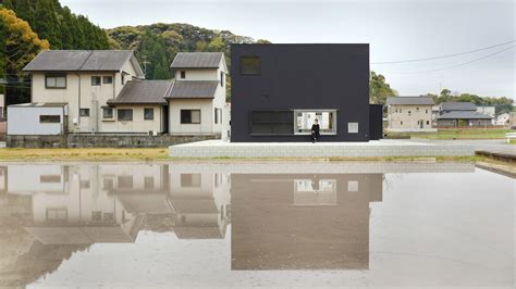 corrugaret metal residenial houses japanese architect|Atelier Kento Eto designs minimal black house hiding lofty.